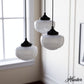 19502_1_saddle_creek_shiny_cased_white_glass_3_light_round_pendant_cluster-noble_bronze-lifestyleimages1c