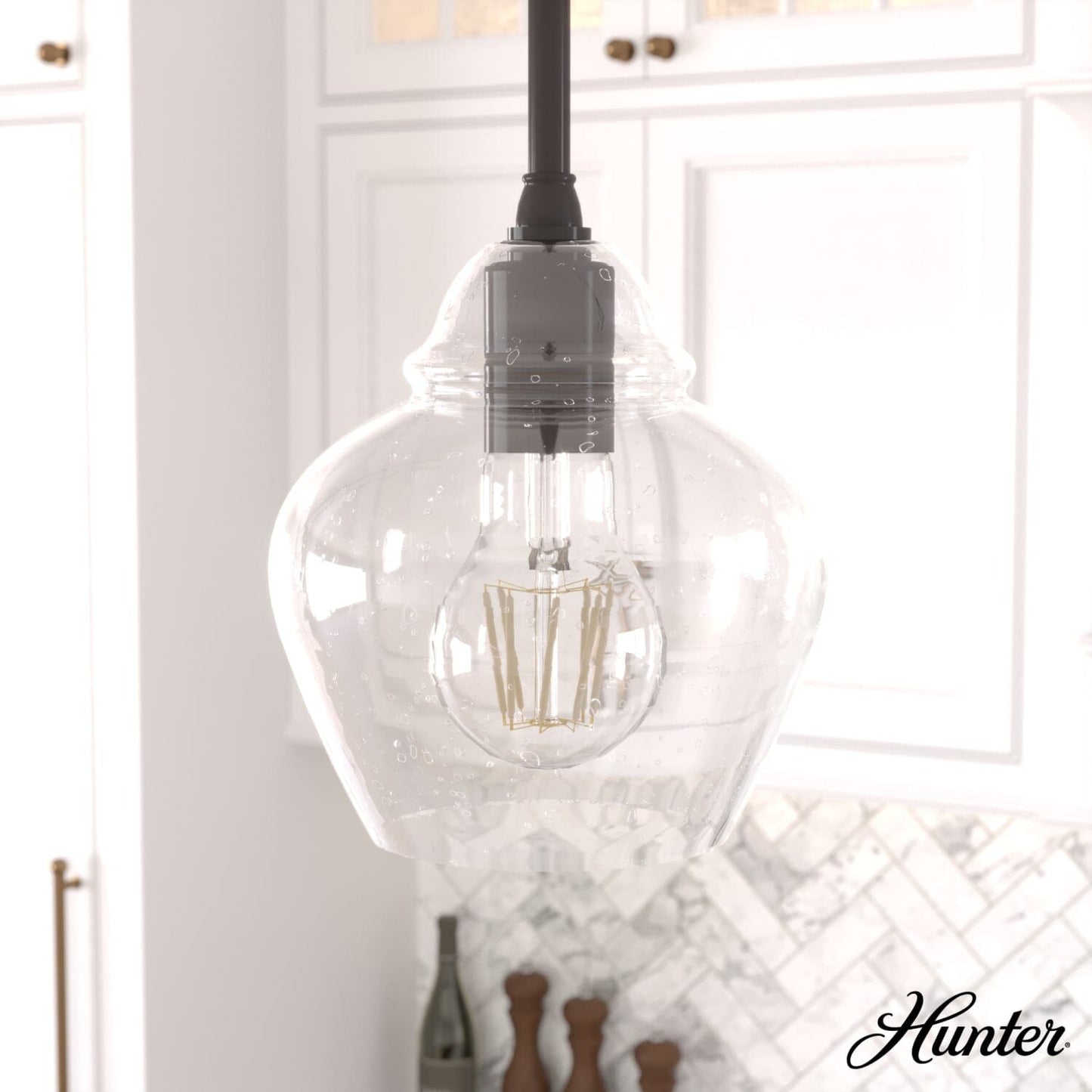 19649_1_dunshire_ginger_jar_clear_seeded_glass_1_light_6.75_inch_mini_pendant-noble_bronze-lifestyleimages1c