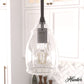 19653_1_dunshire_curved_vase_clear_seeded_glass_1_light_5.25_inch_mini_pendant-noble_bronze-lifestyleimages1c
