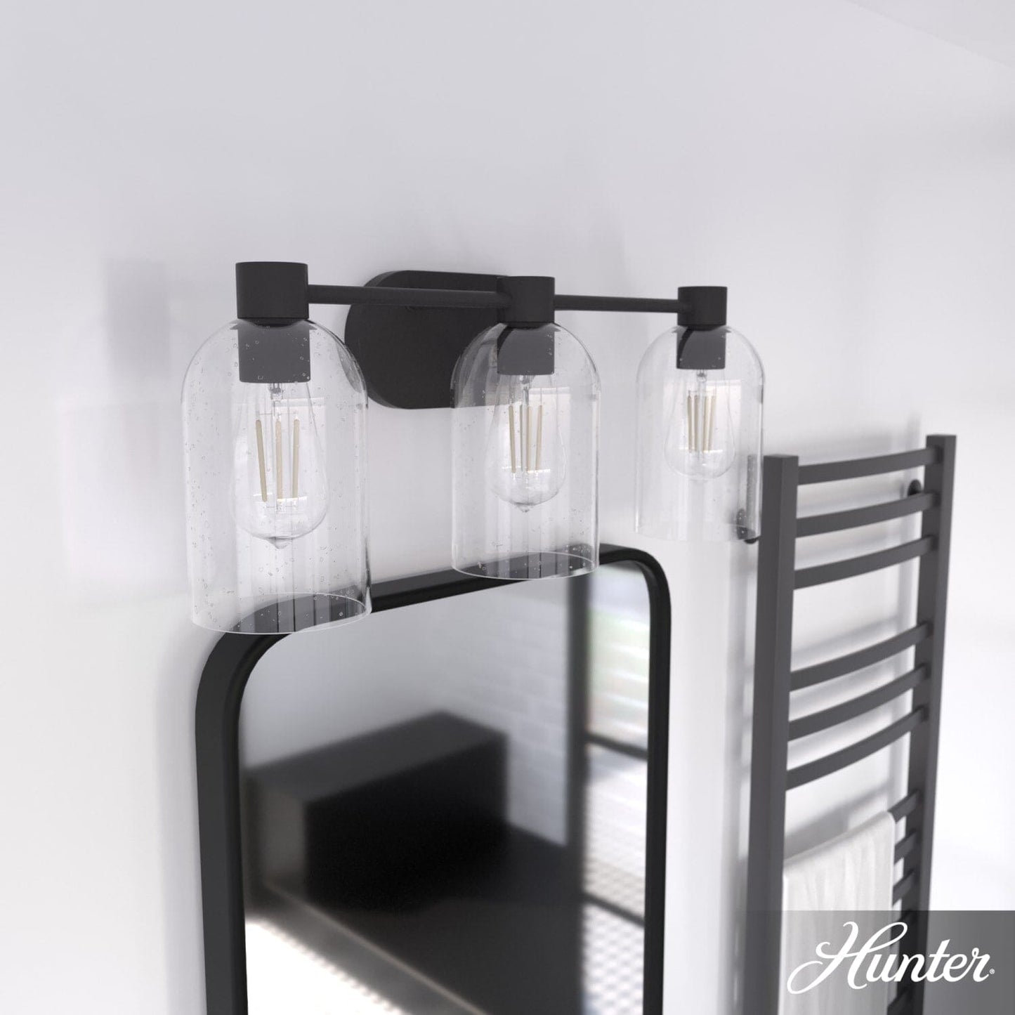 19712_1_lochemeade_clear_seeded_glass_3_light_vanity-noble_bronze-lifestyleimages1c