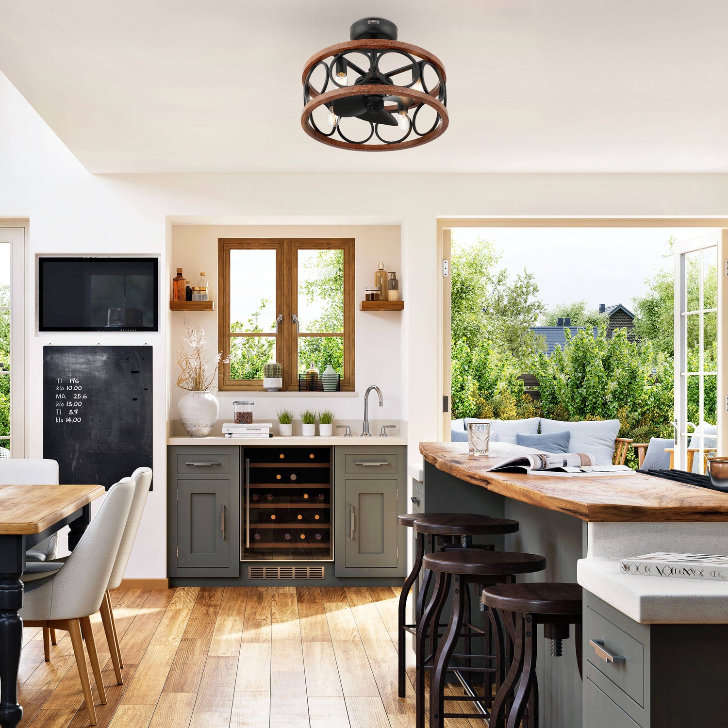 Modern kitchen with Bridgette Fandelier, wooden countertops, gray cabinets, and a view of greenery outside.