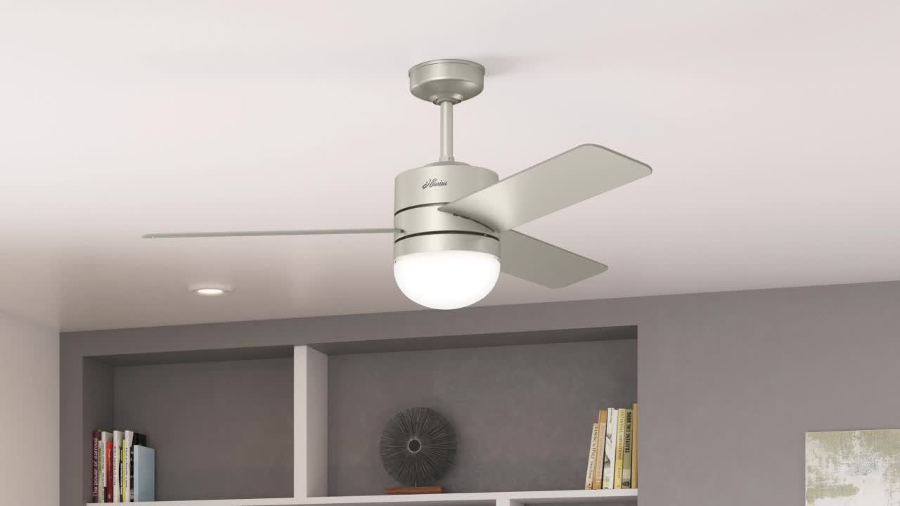 White ceiling with 54 Inch Neutron smart ceiling fan with LED light, mounted with downrod in matte nickel finish.