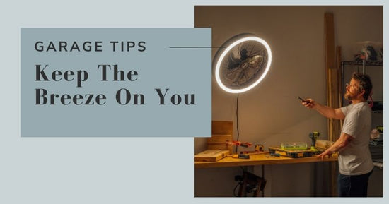 Person using a remote control to operate a fan in a garage with text 'Garage Tips: Keep The Breeze On You'.