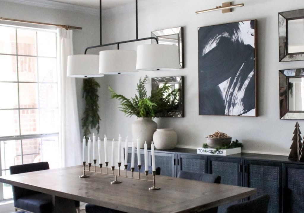 Dining room featuring Cottage Hill linear chandelier in a black iron finish.