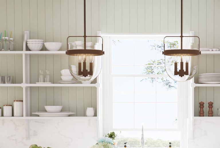 Karloff 3 light pendants in a textured rust finish. 