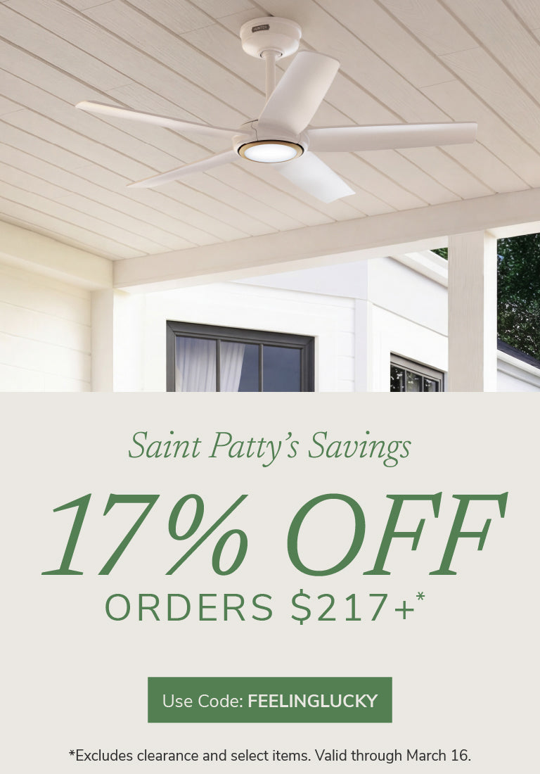 White ceiling fan with light on white porch ceiling and text that reads 17% off orders $217 or more with code FEELINGLUCKY through March 16th