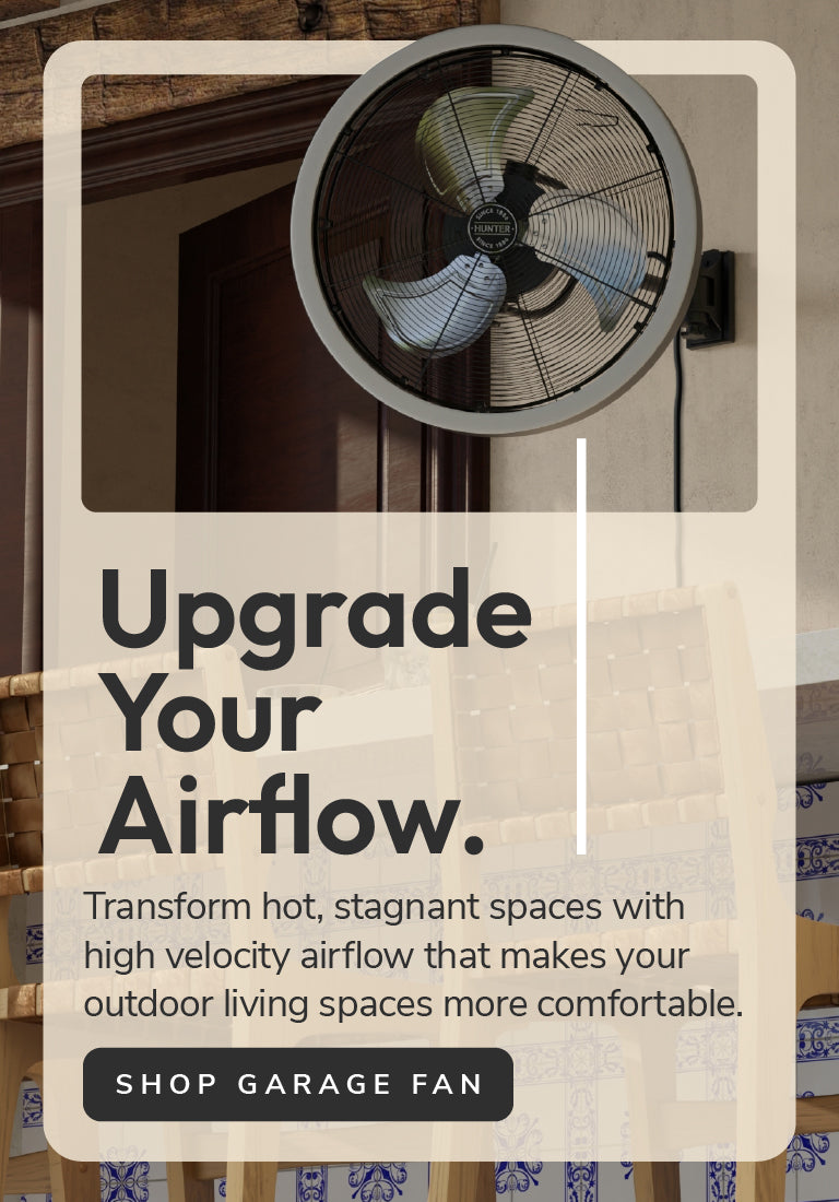 Fan mounted on outdoor wall with message to upgrade your airflow and button to 'Shop Garage Fan'.