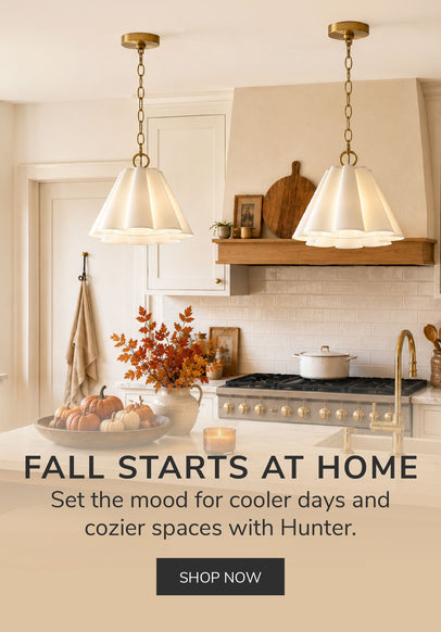 Fall-inspired kitchen with Hunter lighting and warm autumn décor, with text reading Fall Starts at Home.